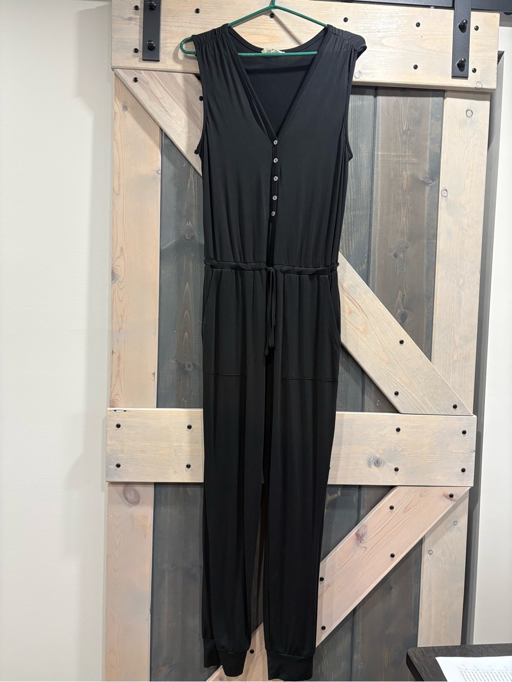 Black Sleeveless Button-Front Jumpsuit